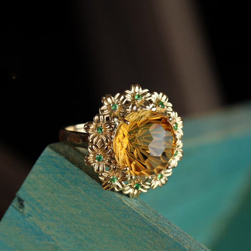 whisperCrystal™ Ice Flower Cut Citrine Ring featuring a dazzling precision-cut yellow crystal, elegant floral halo