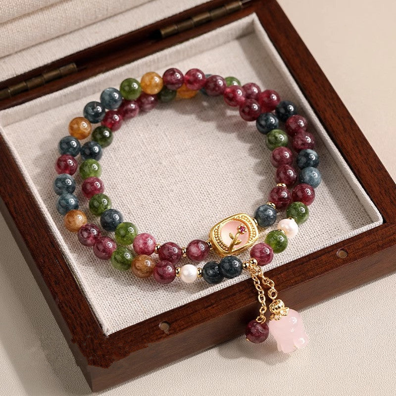 WhisperCrystal™ Multicolor Tourmaline Double Wrap Bracelet featuring a Rose Quartz Lily of the Valley charm