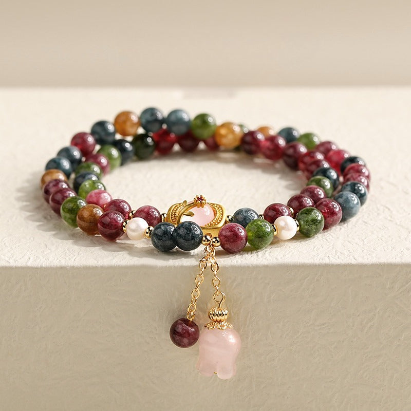 WhisperCrystal™ Multicolor Tourmaline Double Wrap Bracelet featuring a Rose Quartz Lily of the Valley charm