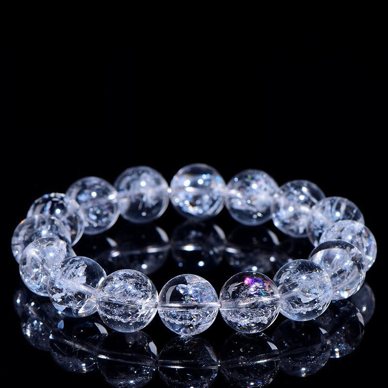 WhisperCrystal™ Natural Himalayan Rainbow Clear Quartz Bracelet featuring hand-polished transparent round beads with natural rainbow inclusions, available in classic clear and rainbow styles for everyday crystal jewelry.
