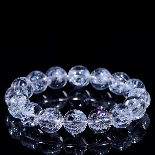 WhisperCrystal™ Natural Himalayan Rainbow Clear Quartz Bracelet featuring hand-polished transparent round beads with natural rainbow inclusions, available in classic clear and rainbow styles for everyday crystal jewelry.