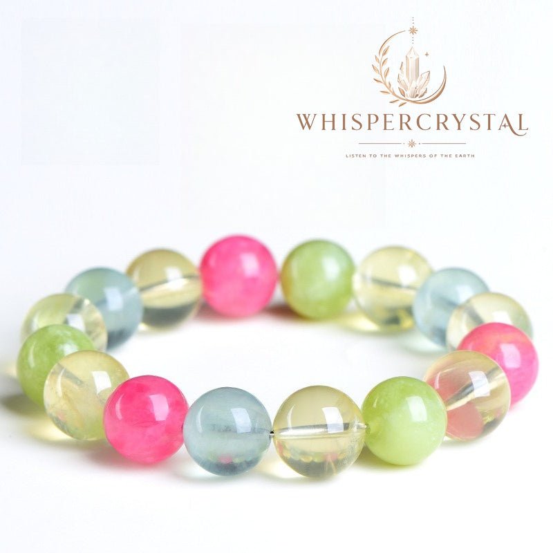 WhisperCrystal™ Natural Multi-Gemstone Crystal Bracelet featuring smooth hand-polished round beads in soft green, blush pink, sky blue, and golden tones, designed as an elegant crystal bracelet for women.