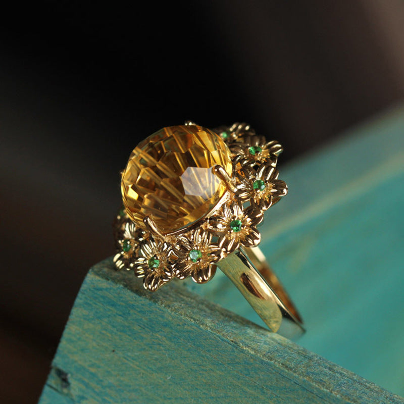 whisperCrystal™ Ice Flower Cut Citrine Ring featuring a dazzling precision-cut yellow crystal, elegant floral halo
